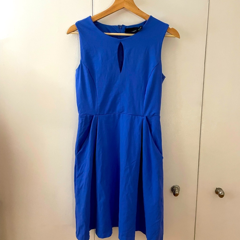 Business casual dress with fun pop